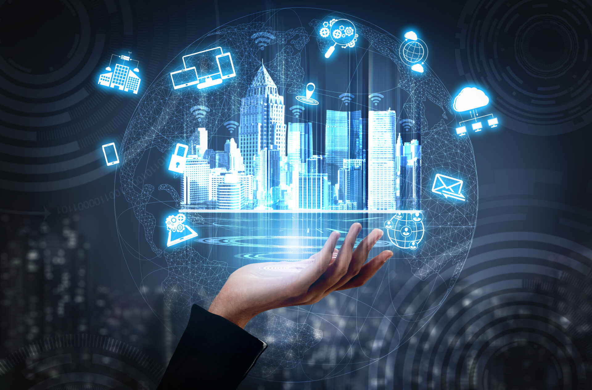 Stockgrafik einer Hand auf der ein Hologramm einer Stadt abgebildet ist.